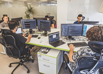 Developers working on laptops